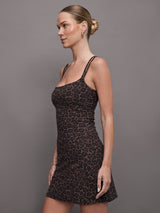 Brown leopard print athleisure dress hitting at mid thigh with double spaghetti straps. 